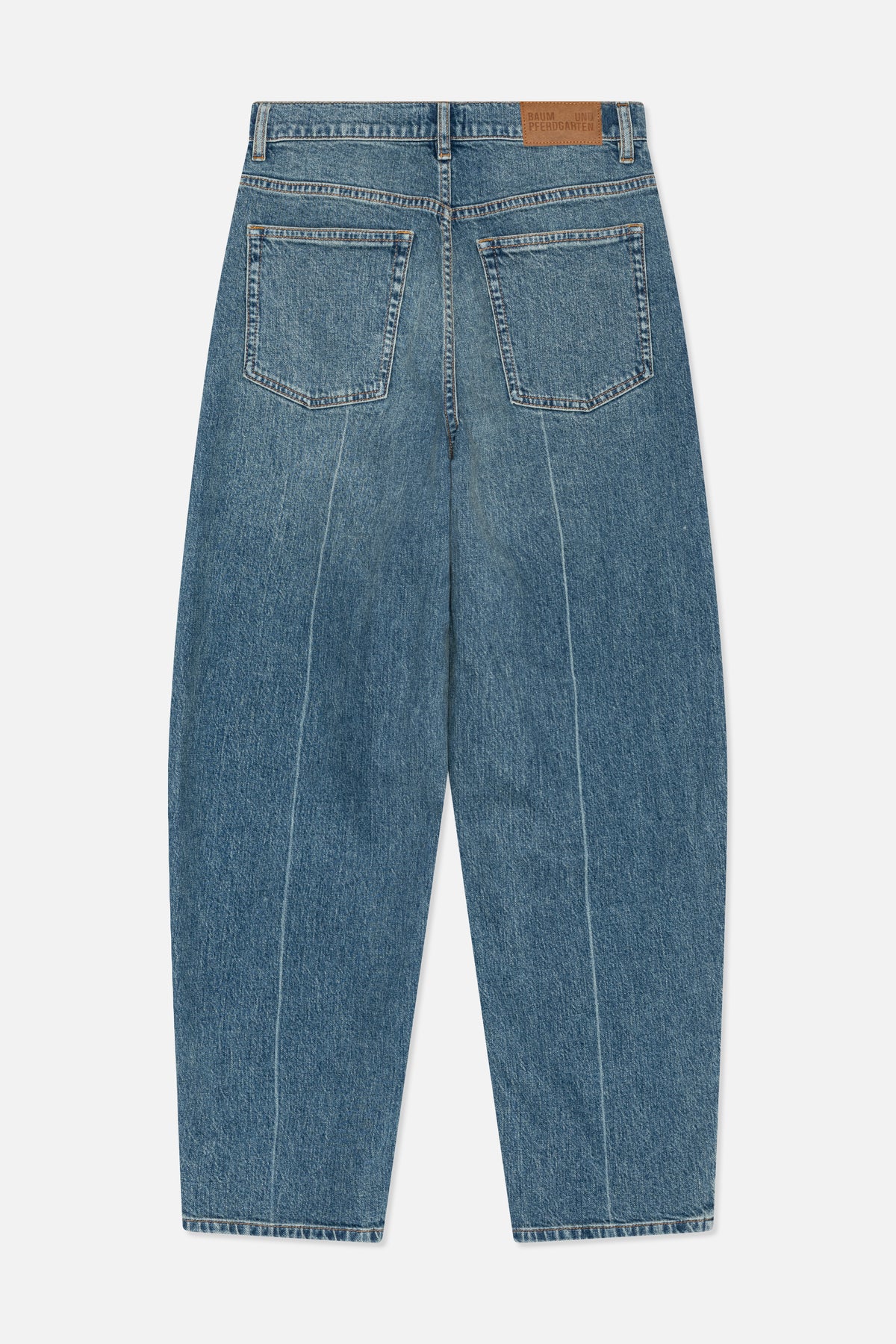 Back view of blue washed denim jeans with two patch pockets, contrast stitching and a tan waistband patch.