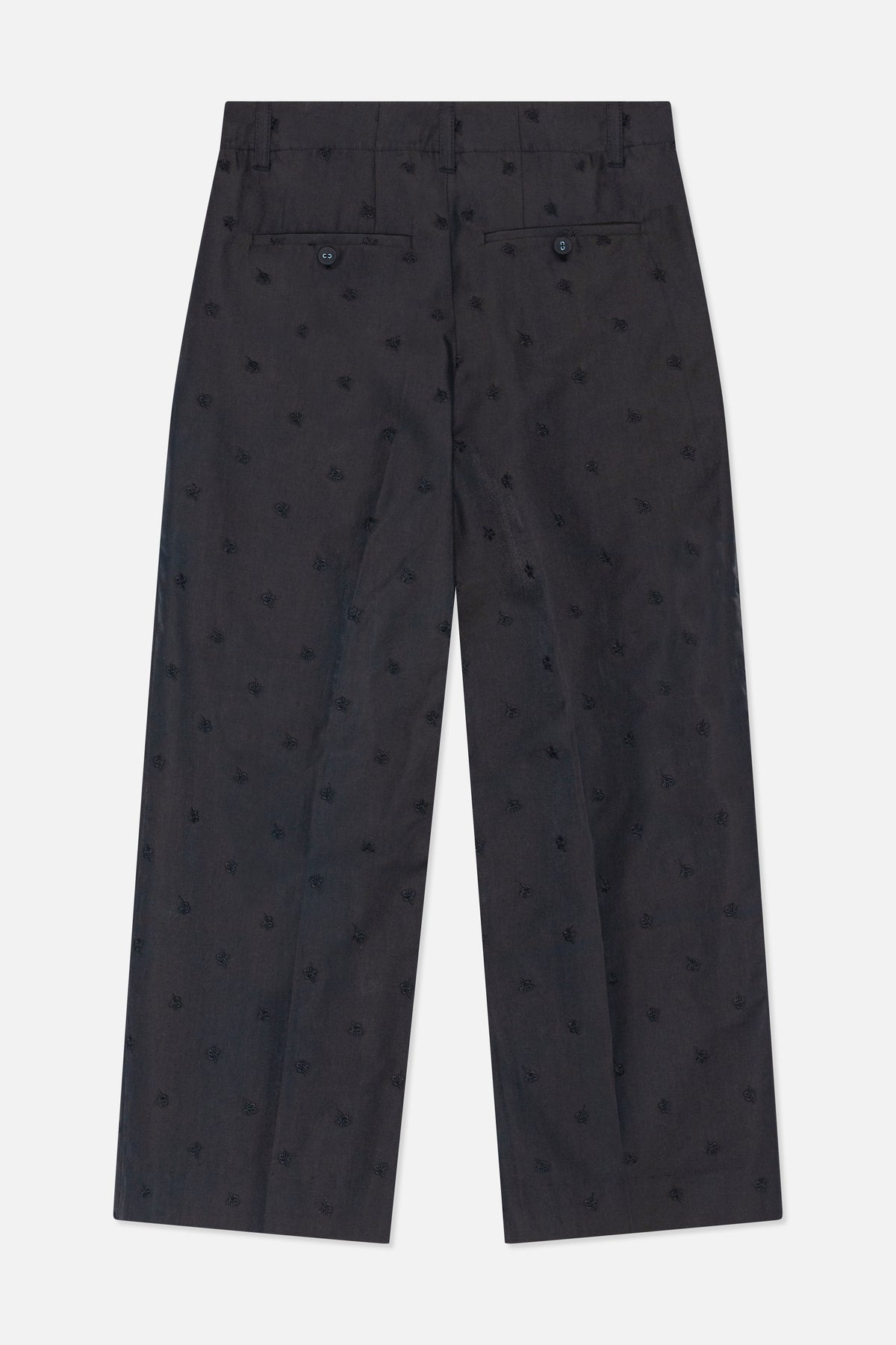For- og bagvisning af koksgrå bukser med spredt tone-i-tone blomsterbroderi og knappede taljedetaljer.