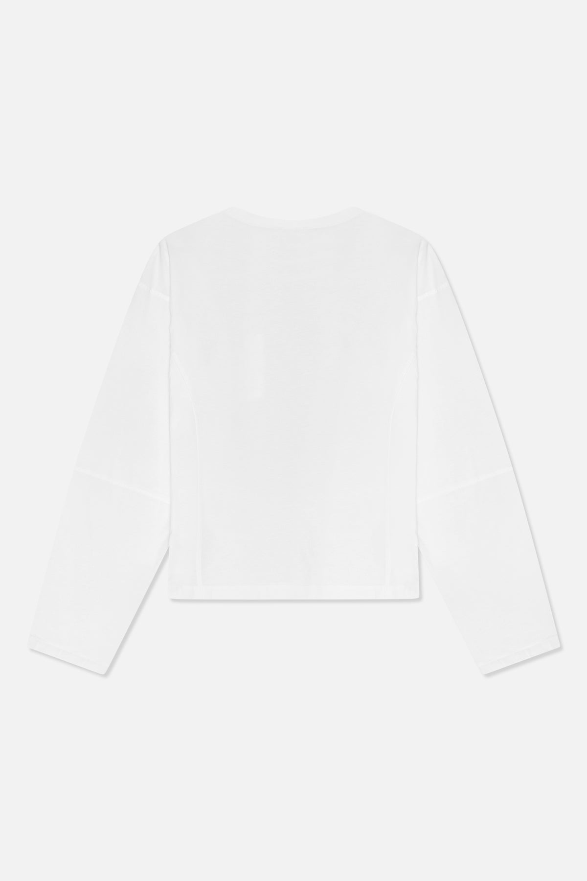 Back view of a plain white long-sleeved crew-neck top with a straight hem and subtle seam detailing.